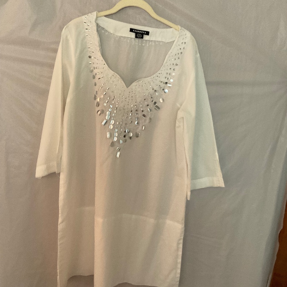 Slightly Used beach cover up with beads on front